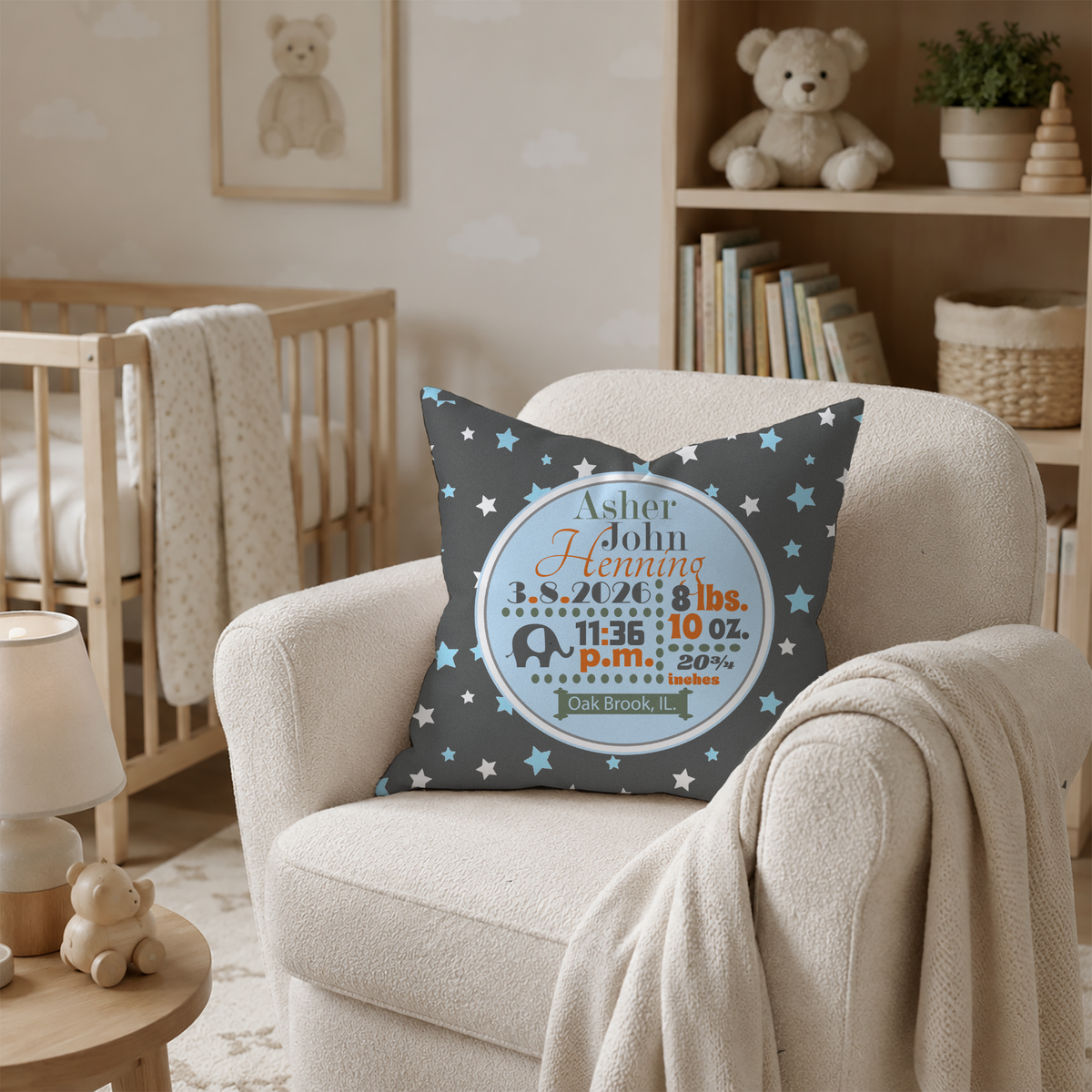 Decorative pillow with baby information on a chair in a nursery, birth stats pillow