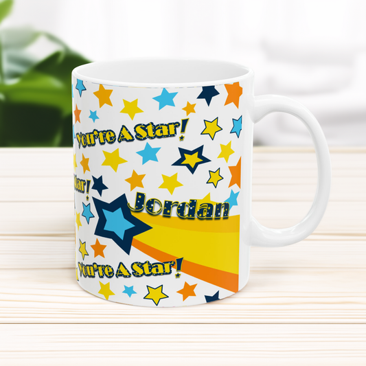 White mug with colorful star pattern 