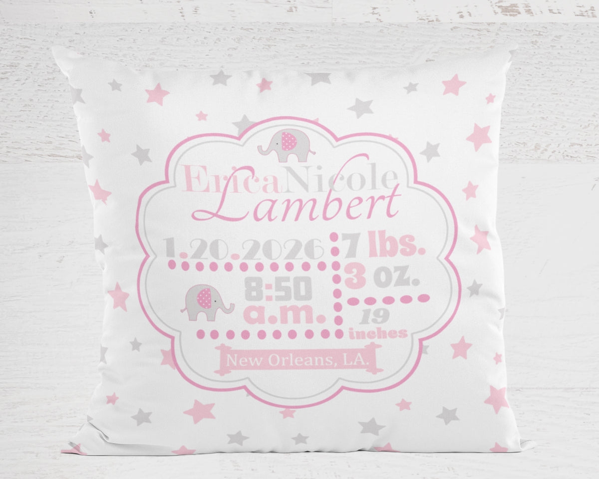 Personalized baby pillow with pink and gray design on a light gray background