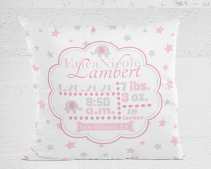 Personalized baby pillow with pink and gray design on a light gray background