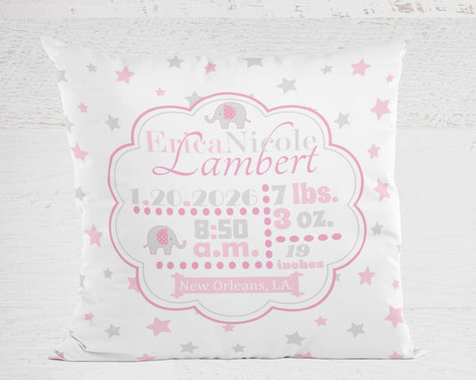 Personalized baby pillow with pink and gray design on a light gray background
