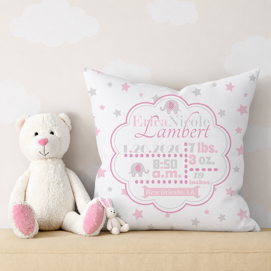 Personalized birth stats in pink pillow with baby details and a plush teddy bear on a light background