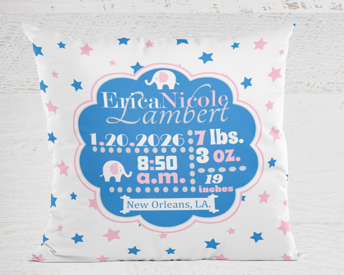 Decorative pillow with personalized baby birth details in cerulean blue and pink on a white background