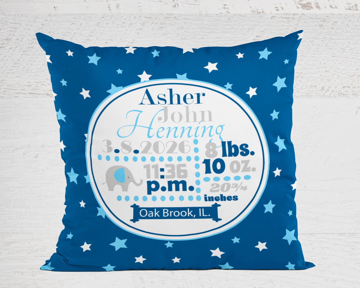 Personalized newborn stats pillow with baby details on a blue star-patterned background