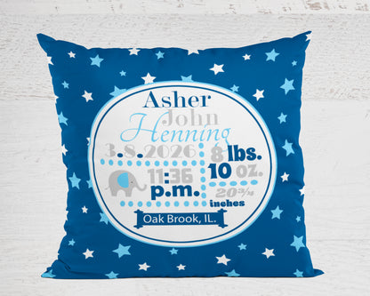 Personalized newborn stats pillow with baby details on a blue star-patterned background