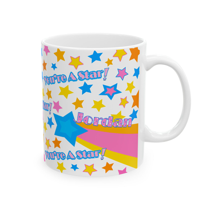 White mug with colorful star pattern and 'You're A Star! Jordan' text on a white background